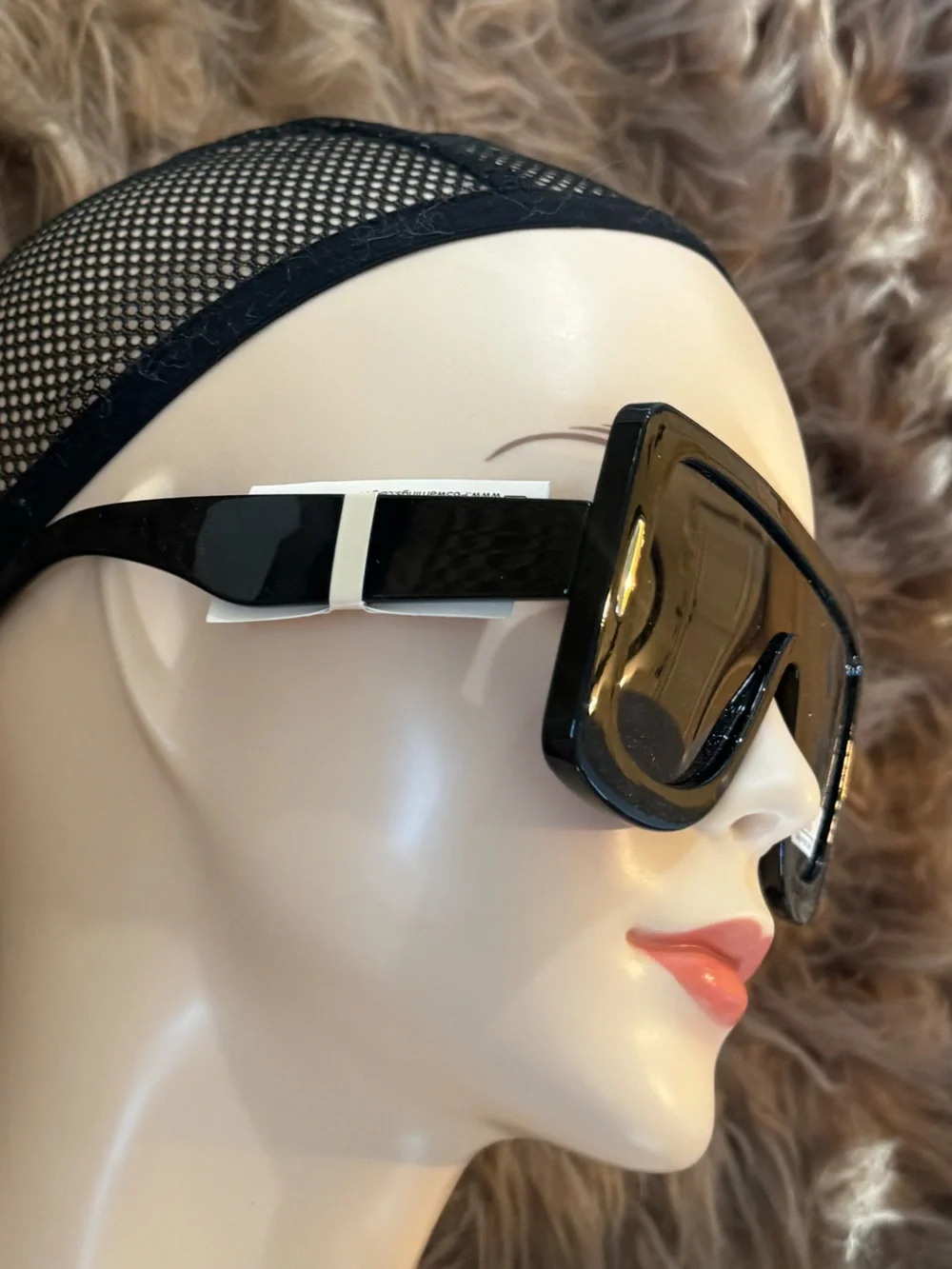 Futuristic sunglasses with gold details
